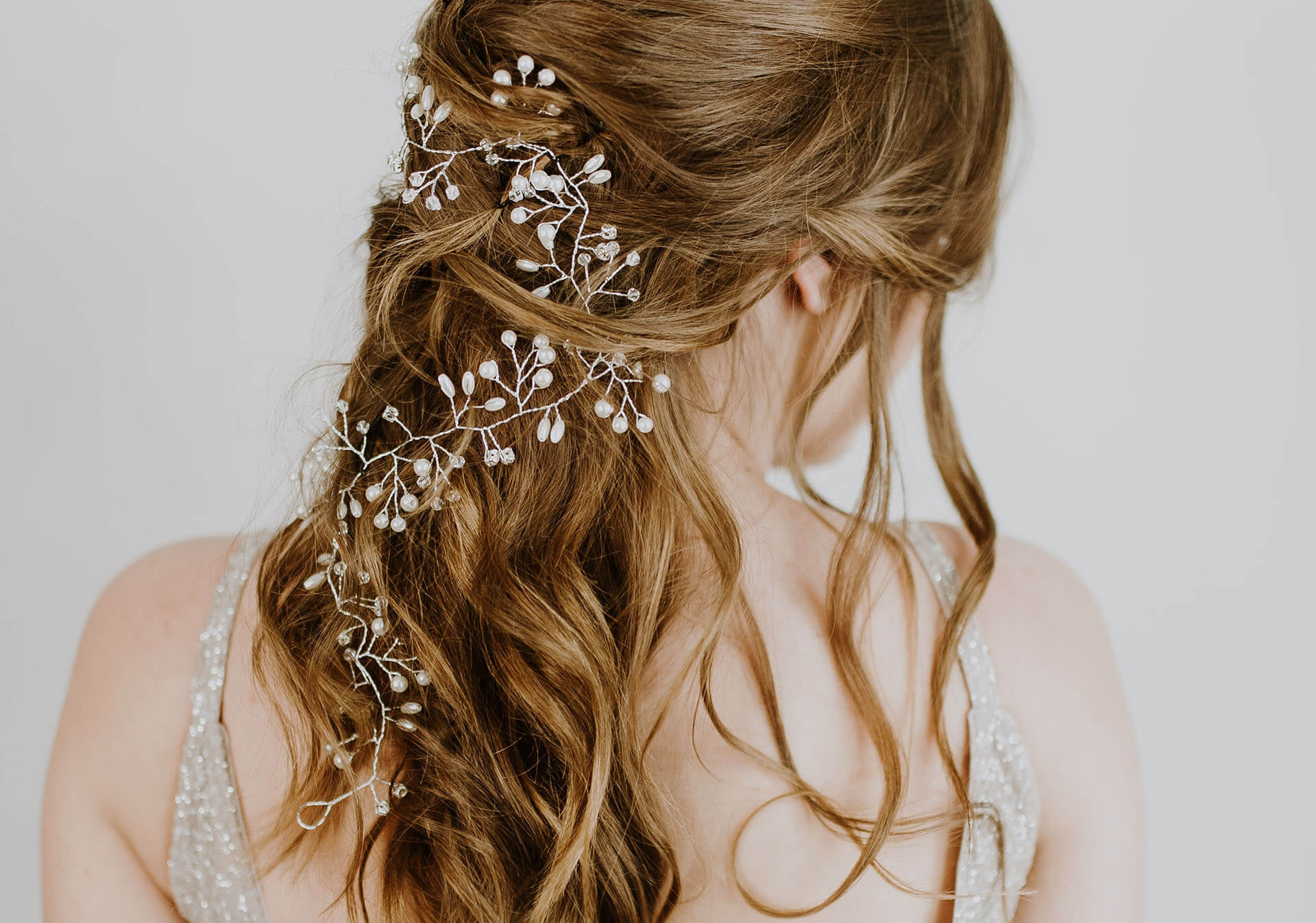 Try this casual messy low updo for your next event